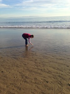 Stanley with his feet in the oceean!
